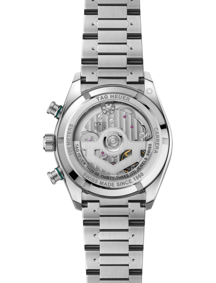 Stainless steel TAG Heuer Carrera watch with a transparent case back showing the mechanical movement inside a metal bracelet.