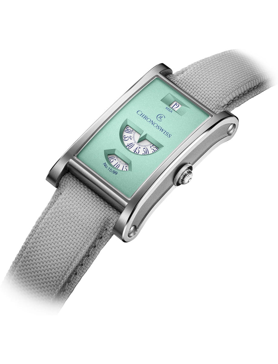 Chronoswiss rectangular wristwatch with a mint dial, dual retrograde displays, and a gray fabric strap.