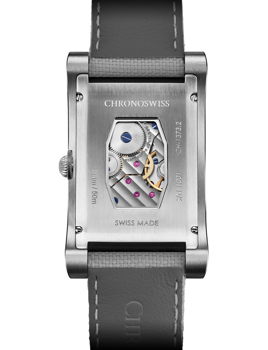 Chronoswiss rectangular stainless steel watch case with a transparent back revealing gears and jewels; CHRONOSWISS, Swiss Made, grey leather strap