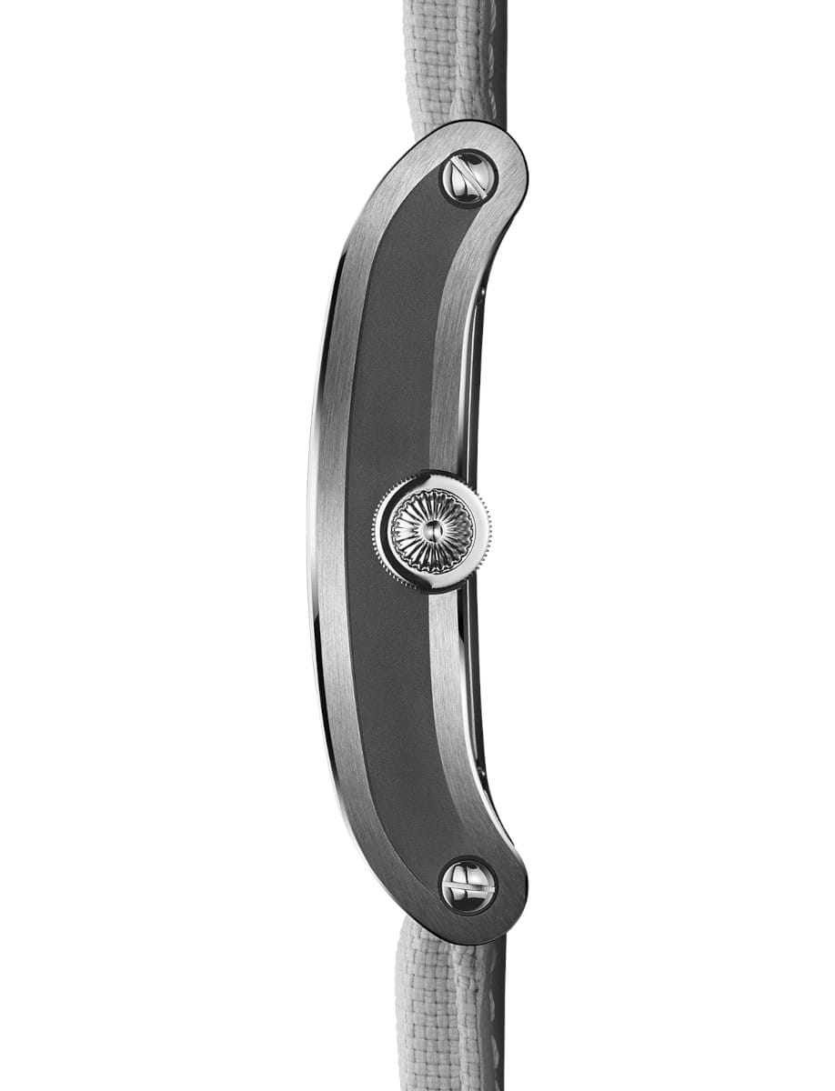 Side view of a Chronoswiss polished stainless steel watch case with a knurled crown and a fabric strap