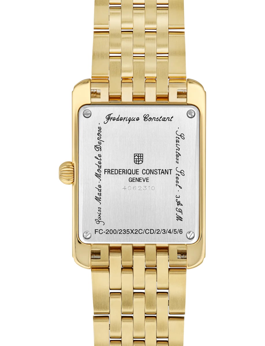 Gold wristwatch with a metal link band; square case back engraved with 'Frederique Constant', 'GENEVE', and decorative script around the edges.