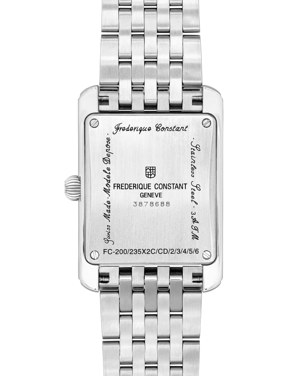 Back of a silver Frederique Constant wristwatch with metal bracelet, showing engravings and serial numbers on the case back