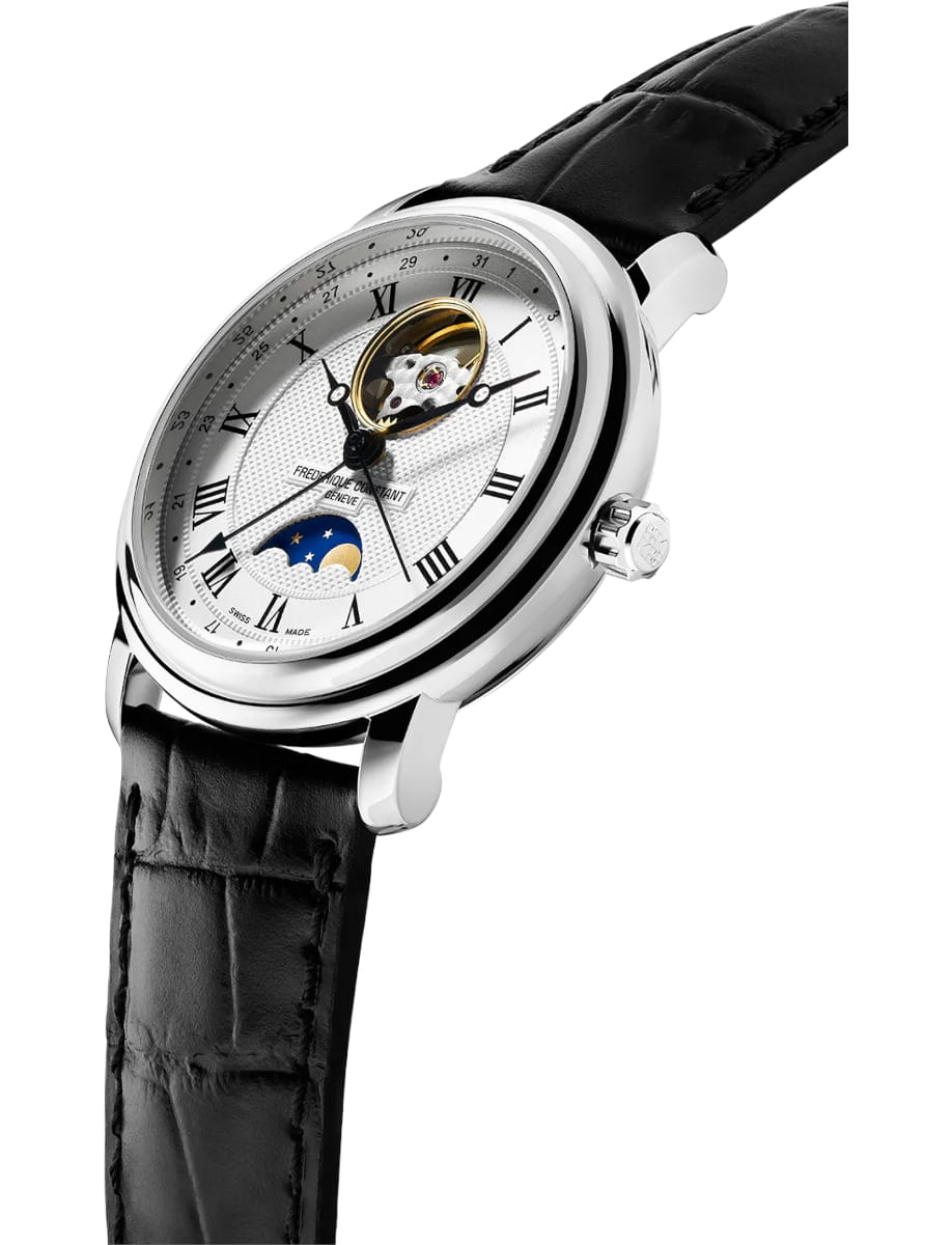 Silver wristwatch with Roman numerals, exposed balance wheel, and moon phase indicator on a white dial with a black leather strap.