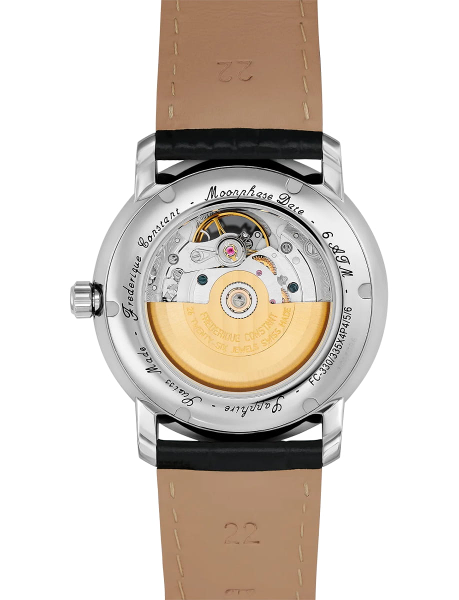 Stainless steel watch with a transparent case back showing the mechanical movement and gold rotor, paired with a tan leather strap on top and bottom side.