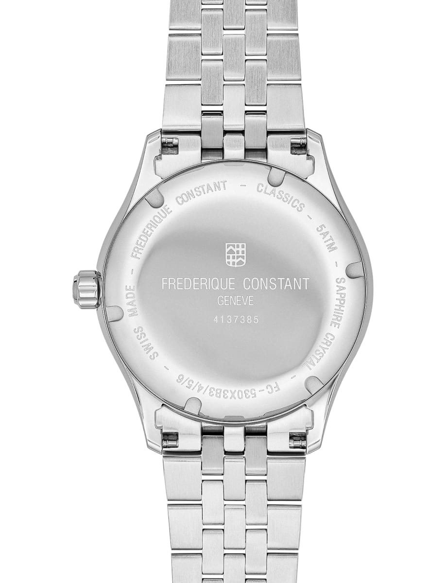 Stainless steel Frederique Constant watch back with engraved brand name, Genève and serial number, attached to a metal link bracelet.