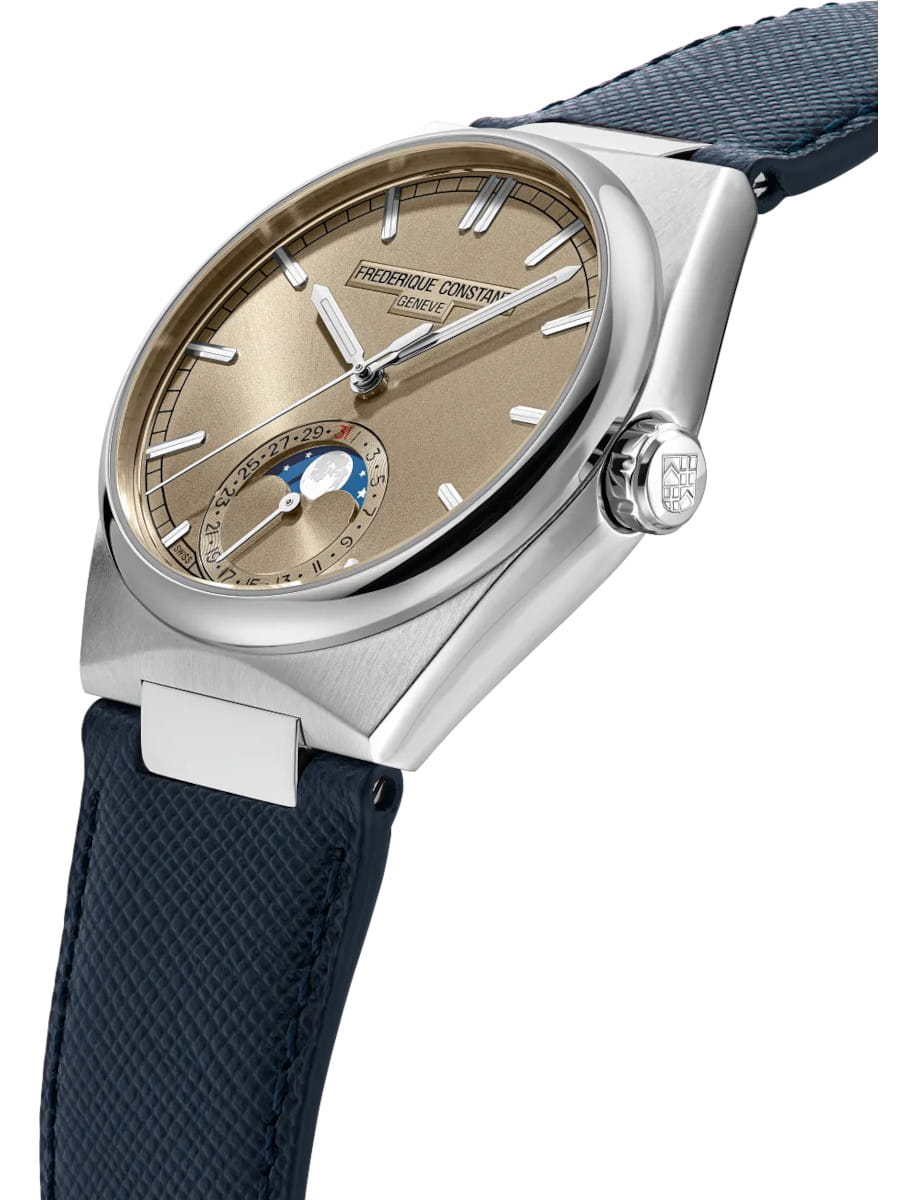 Frederique Constant wristwatch with a gold-tone dial, moon phase subdial, and blue leather strap in a close-up view.