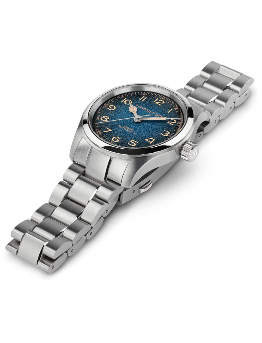 Hamilton automatic stainless steel watch with a blue textured dial and stainles steel bracelet.
