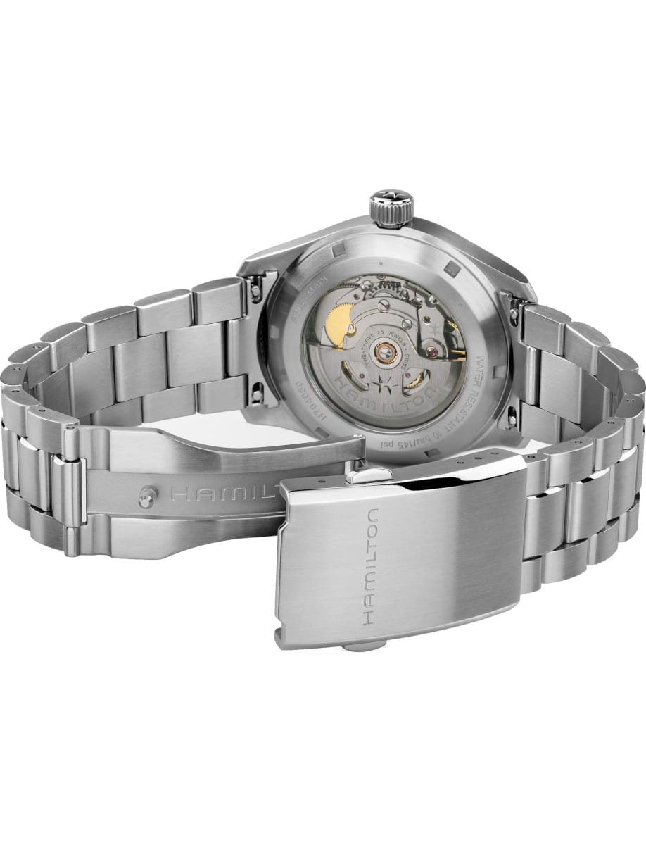 Stainless steel Hamilton wristwatch with a transparent case back showing its automatic movement and internal gears.