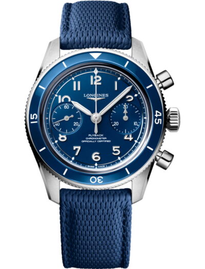 Longines wristwatch with blue dial, stainless steel case and ceramic bezel, and blue fabric strap. | Feldmar Watch Co. Longines wristwatch with blue dial, stainless steel case and ceramic bezel, and blue fabric strap.