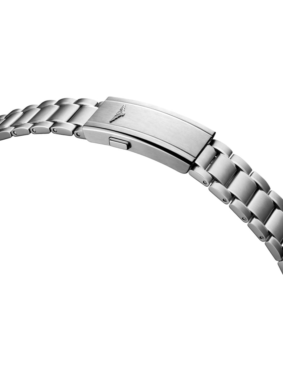 Close-up of a stainless steel watch bracelet with a deployment clasp