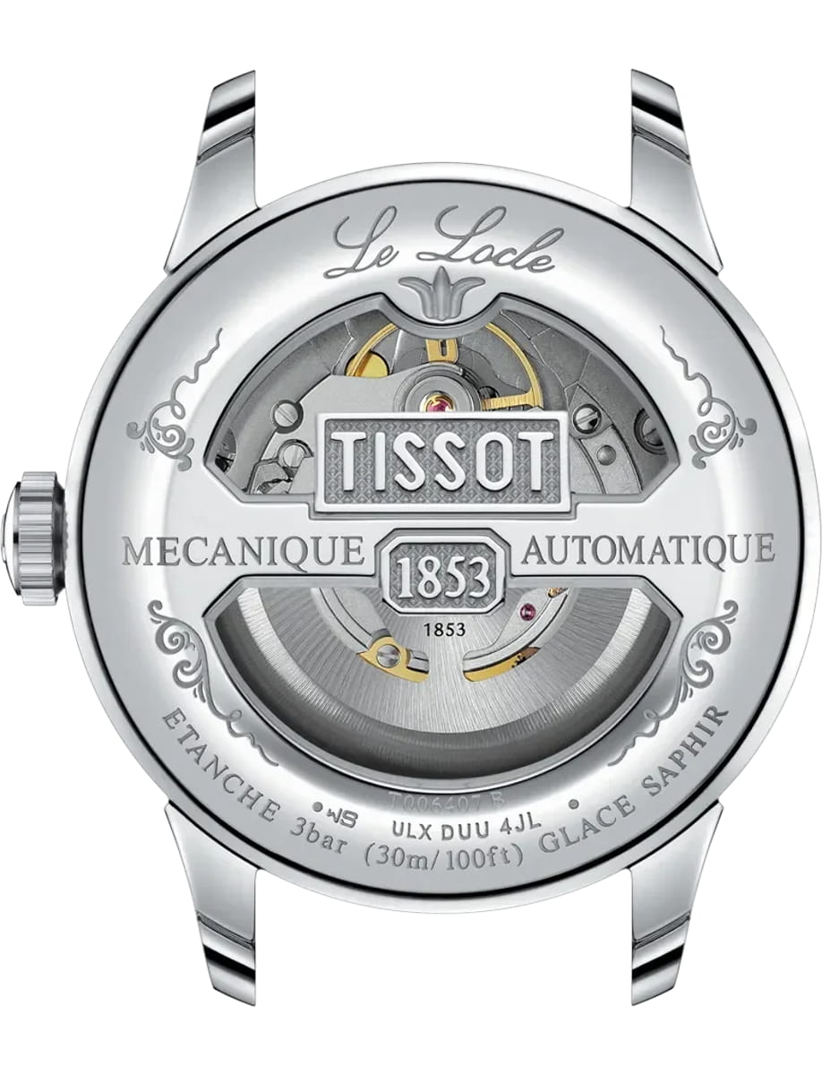 Silver Tissot mechanical automatic watch back with visible movement through a circular window and ornate engravings including 'TISSOT' and '1853'.