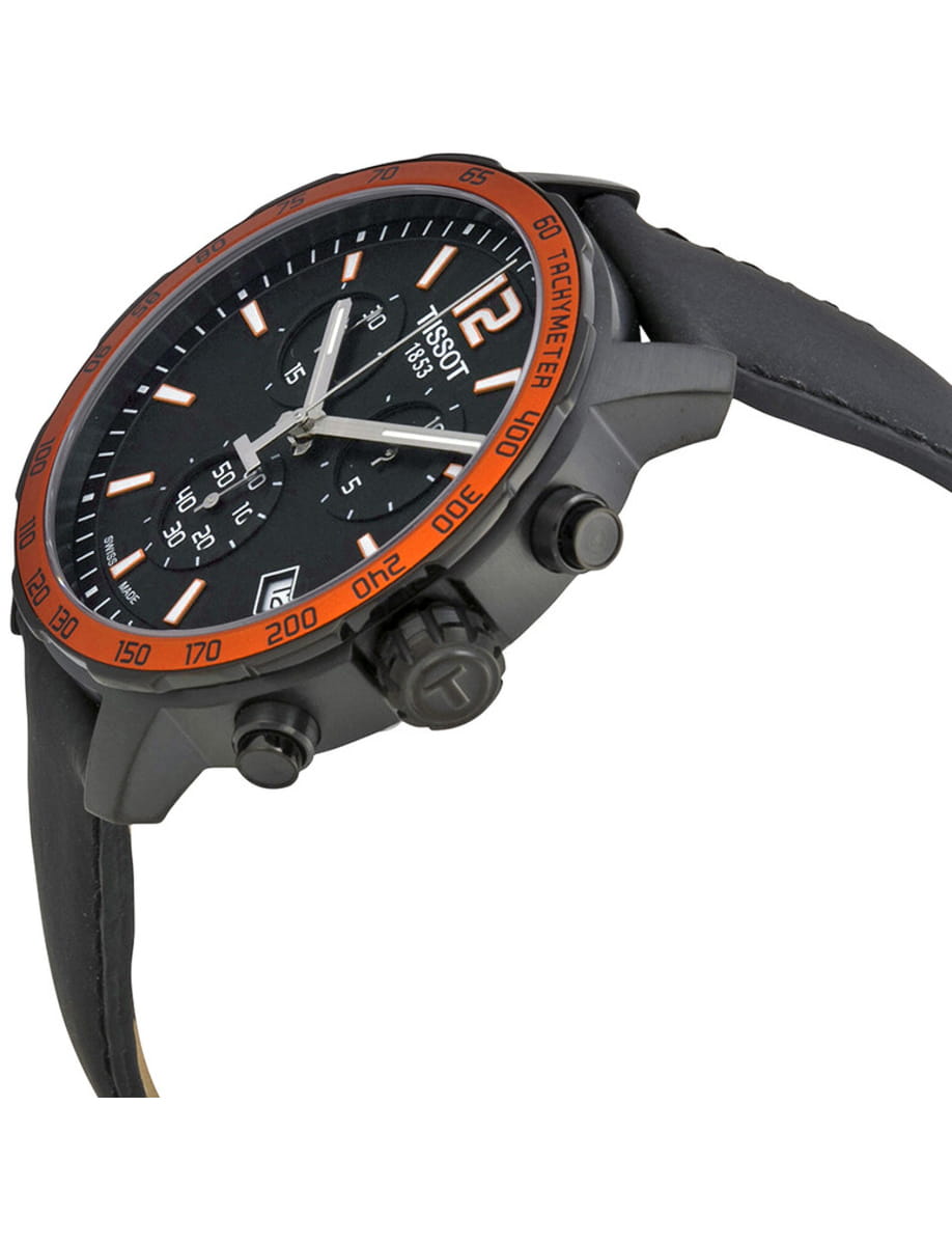Sporty black Tissot chronograph wristwatch with an orange tachymeter bezel and black strap