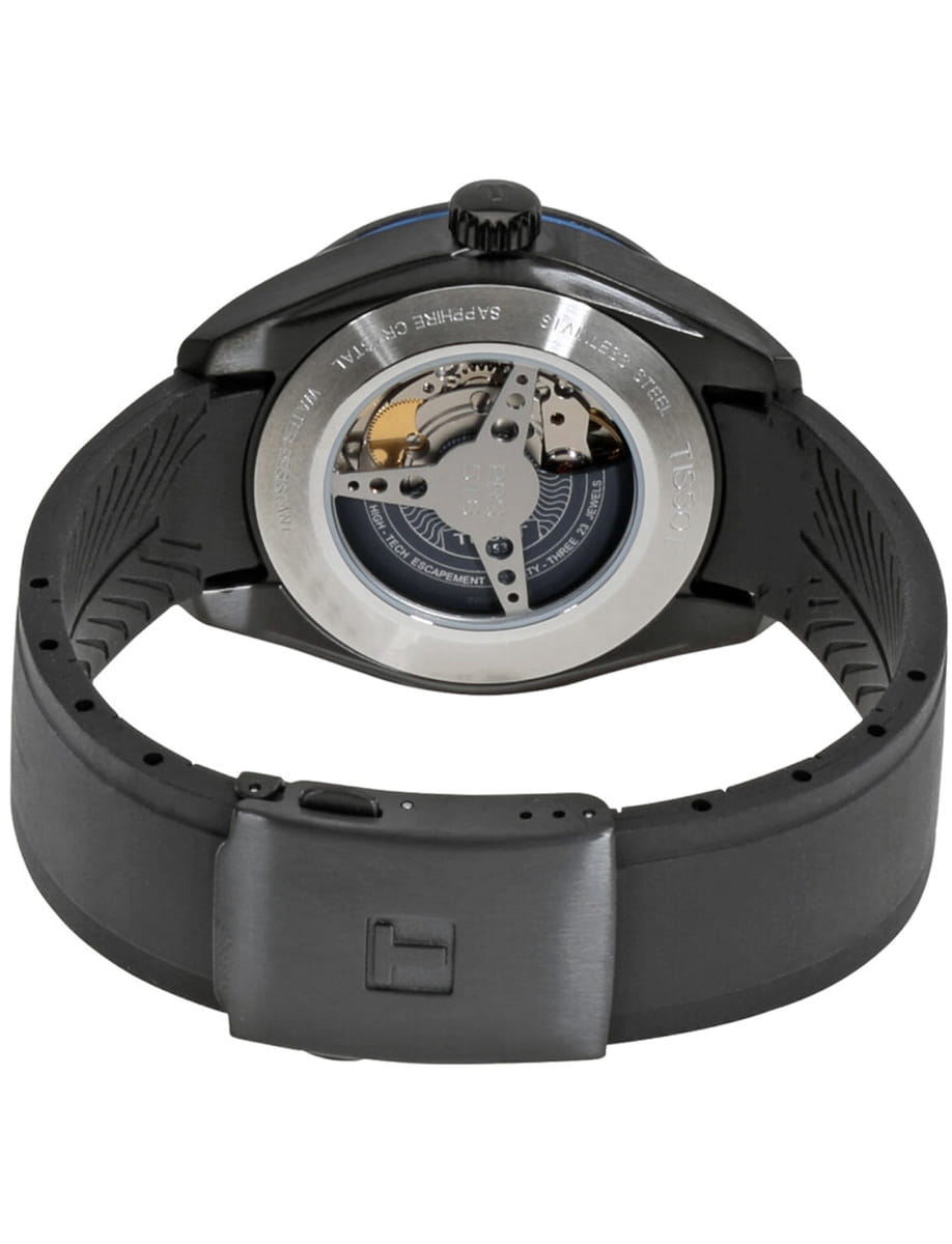 Back view of a black sports watch showing its transparent case back and exposed mechanical movement with a visible rotor, on a black rubber strap.