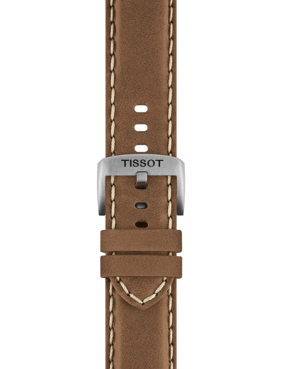 Brown leather watch strap with white stitching and a brushed metal Tissot buckle.