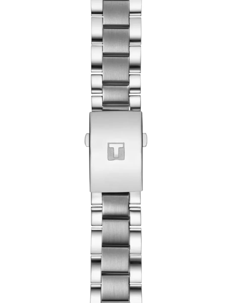 Vertical close-up of a silver brushed stainless steel watch bracelet with a fold-over clasp featuring a small 'T' logo in the center.