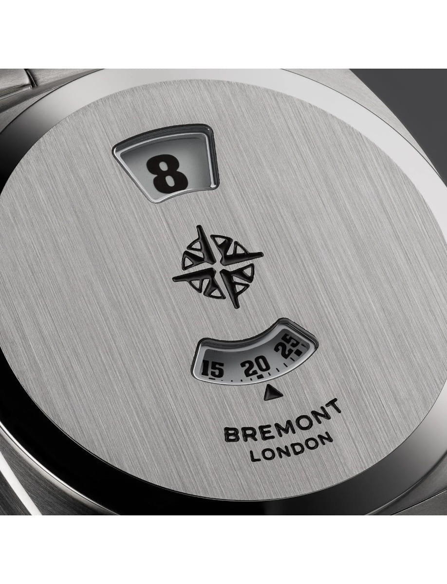 Close-up of a brushed stainless steel Bremont watch dial, showing the date window reading 8.