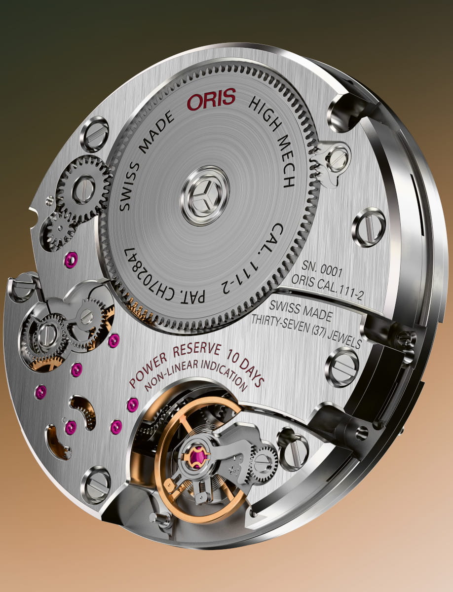 Close-up of a Swiss-made Oris watch movement with gears, jewels and a polished metal finish.