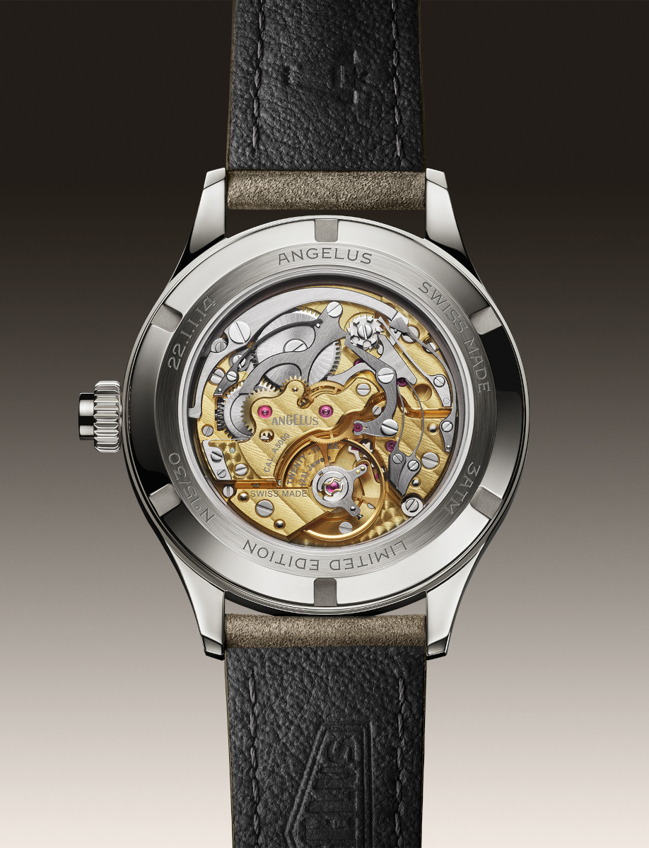 Back of a classic mechanical watch with a transparent case showing gold and silver movement parts, engraved 'ANGELUS' and 'SWISS MADE'