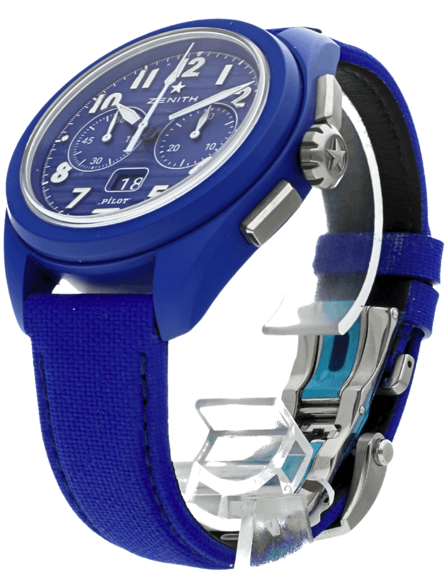 Front left side view of pre-owned Zenith Pilot chronograph wristwatch with a blue fabric strap and large white numerals on a blue dial, date window showing 18 and blue ceramic case.
