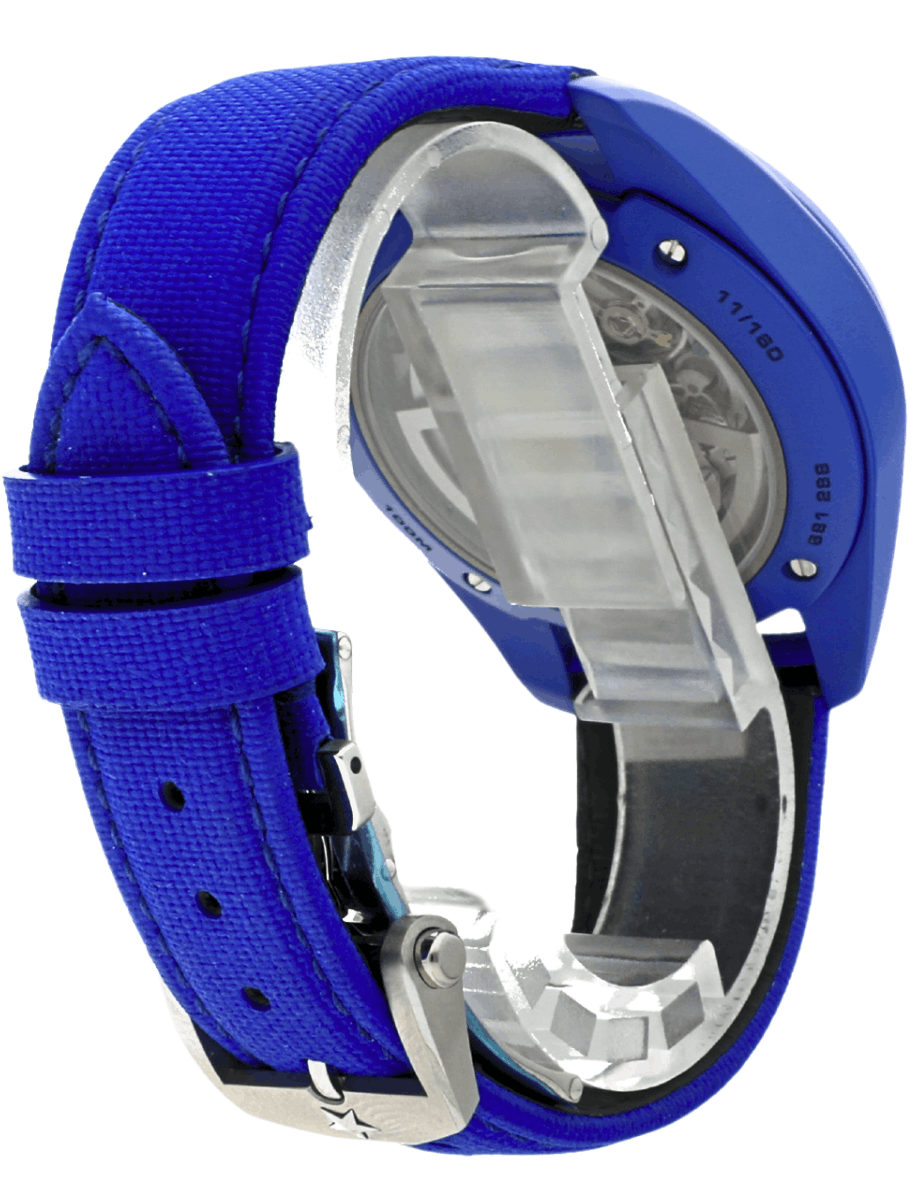 Back view of pre-owned Zenith Pilot chronograph wristwatch with a blue fabric strap, blue ceramic case, and a transparent back showing its mechanical movement.