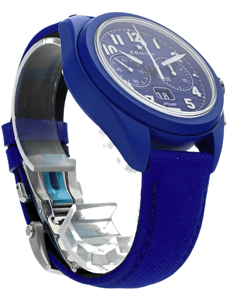 Front right side view of pre-owned Zenith Pilot chronograph wristwatch with a blue fabric strap and large white numerals on a blue dial, date window showing 18 and blue ceramic case.