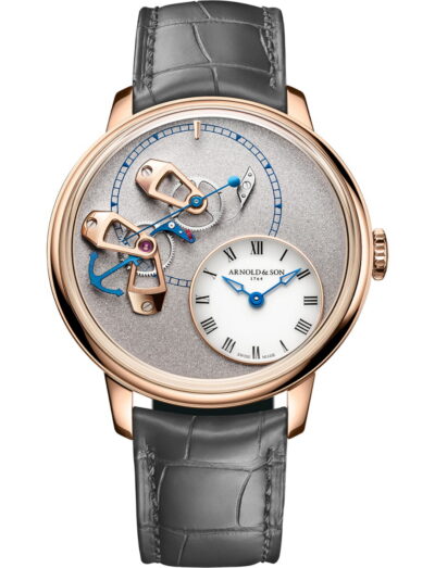 Arnold & Son wristwatch with a 18k 5N red gold case, exposed movement, and a grey leather strap.