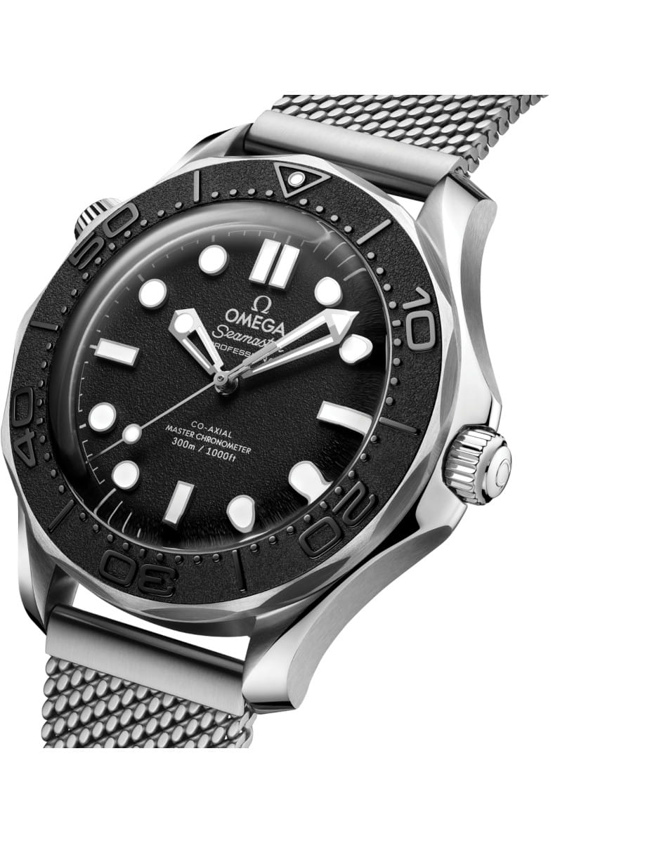 Omega Seamaster diving watch in stainless steel with black bezel and mesh bracelet.