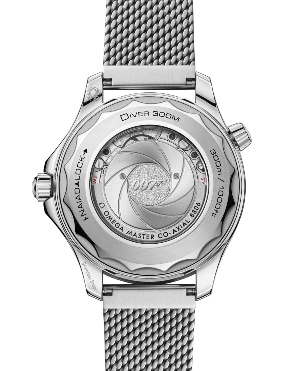 Stainless steel Omega Seamaster Diver 300M case back with an exposed rotor and the 007 logo, mesh bracelet visible above and below.