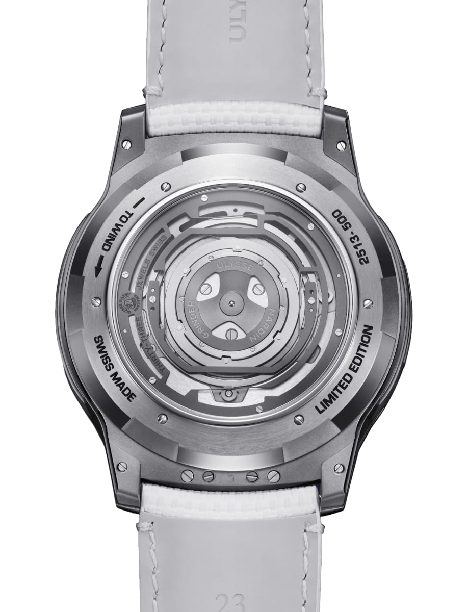 Case back of a limited edition Ulysse Nardin wristwatch with a visible mechanical movement and white rubber strap, showing the rotor through a transparent case back.