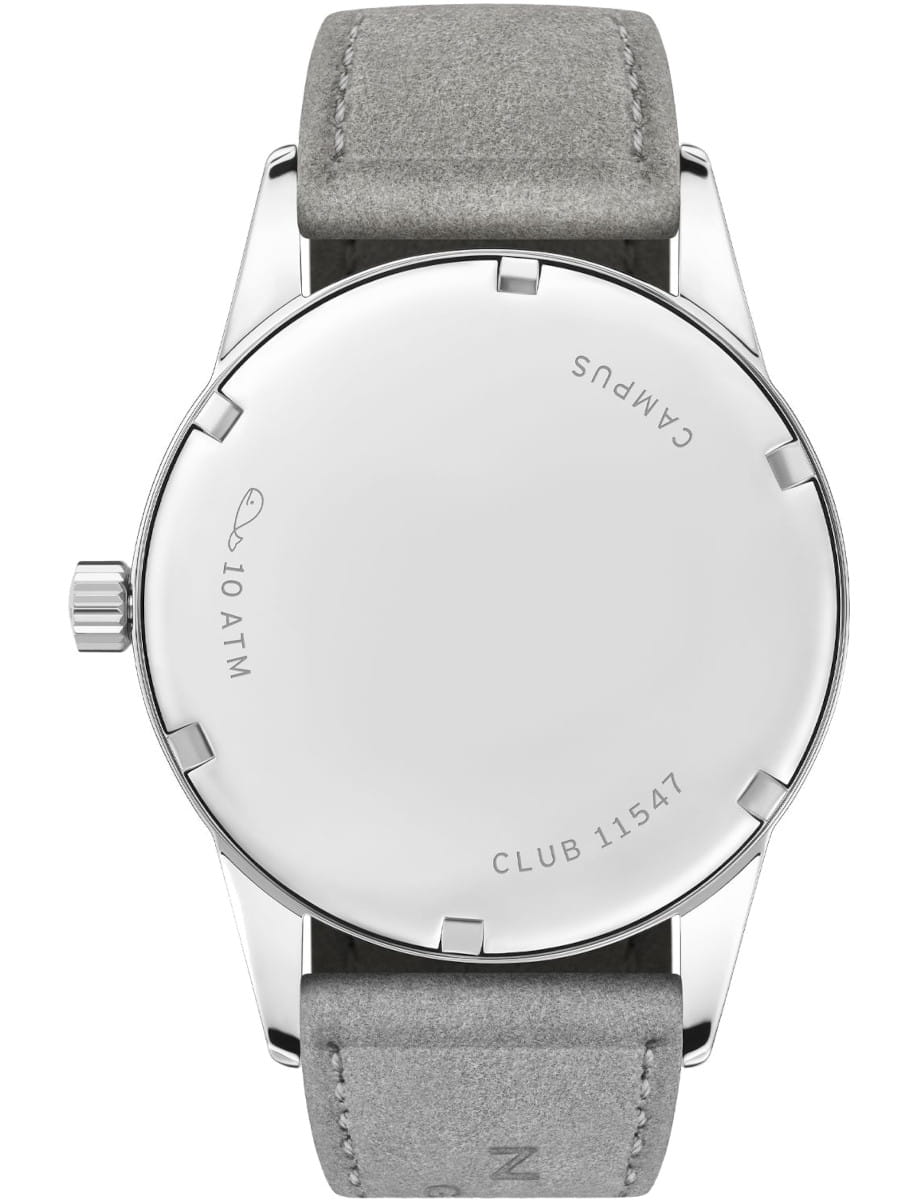 Back of a Nomos stainless steel watch with a gray vegan velour strap, showing the case back and crown, marked 10 ATM and CLUB 11547