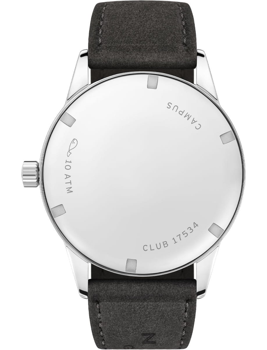 Back of a Nomos stainless steel round wristwatch with a black leather strap; crown on the left, engravings read '10 ATM' and 'CLUB 17534'.