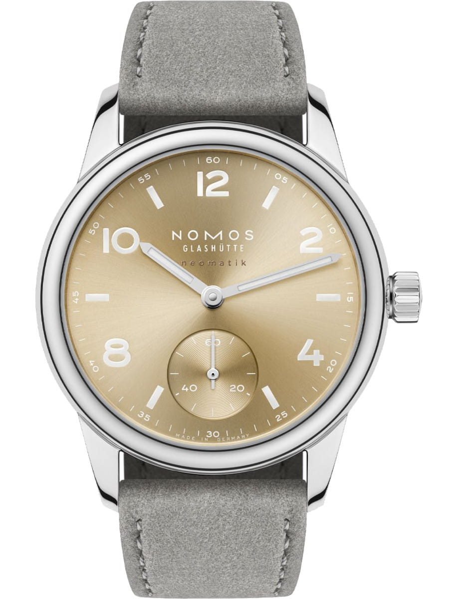 NOMOS Glashütte wristwatch with stainless steel case, grey vegan velour strap and gold dial.