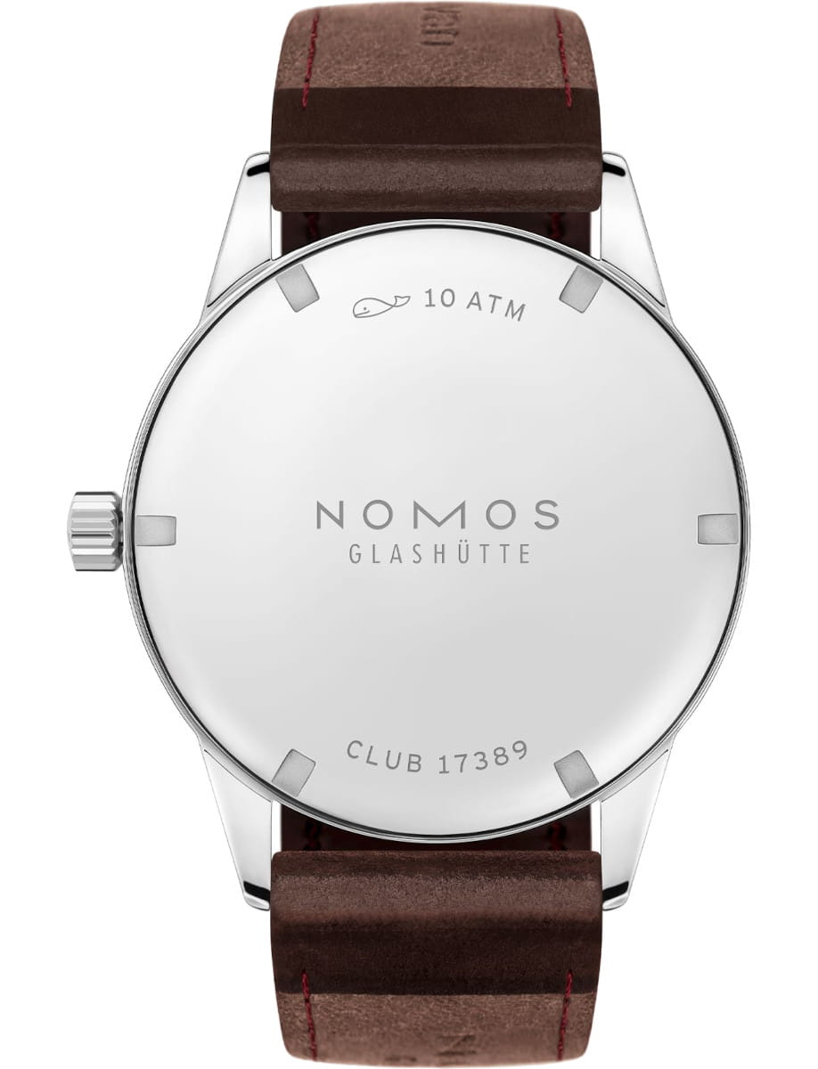 Back view of Nomos Club wristwatch with stainless steel case, Horween Genuine Shell Cordovan brown strap with red stitching, and stainless steel caseback.