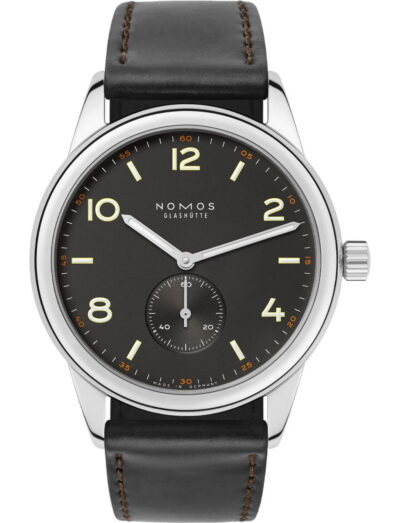 Nomos Club wristwatch with stainless steel case, Horween Genuine Shell Cordovan black strap with brown stitching, and black dial.