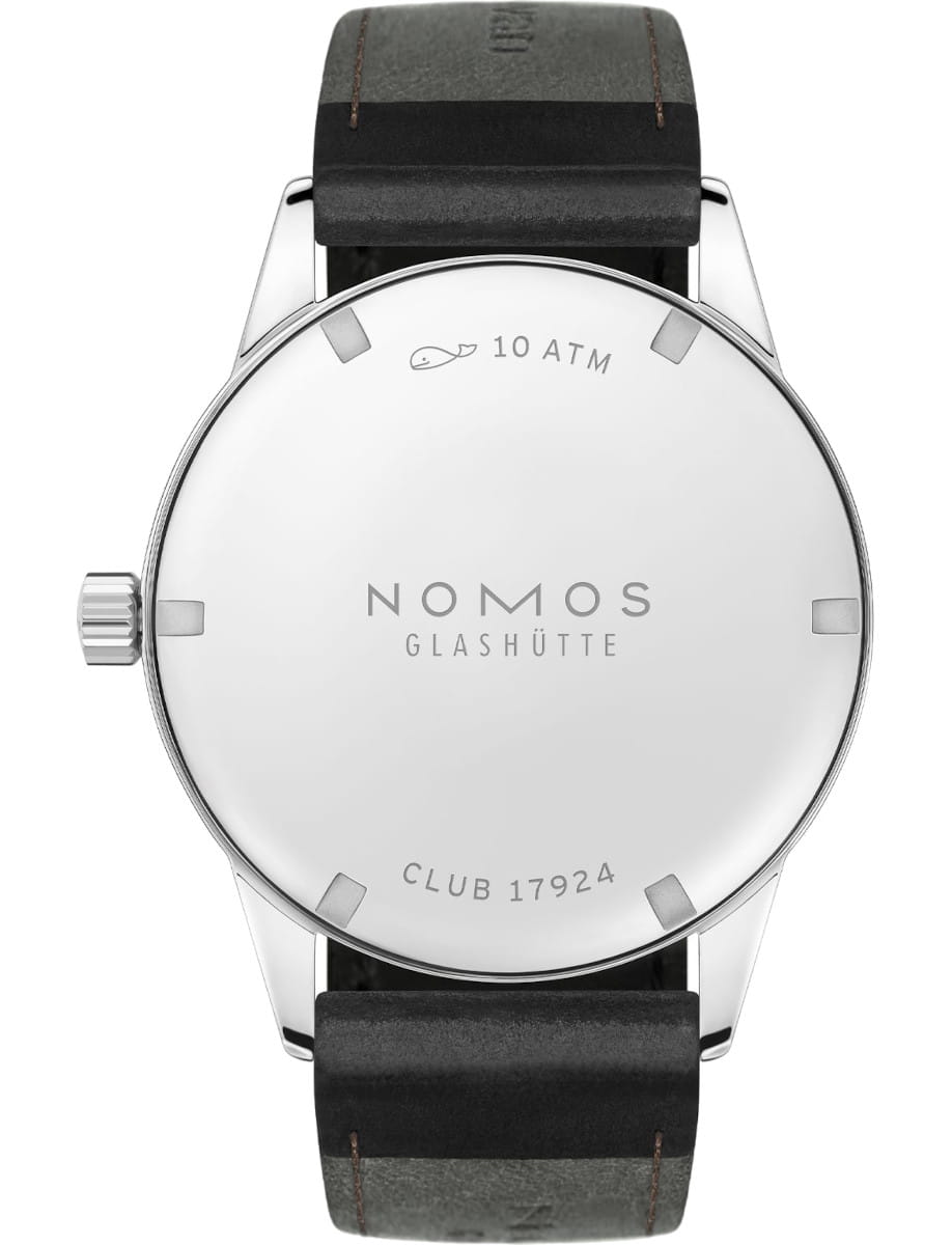 Back of a Nomos Club wristwatch with stainless steel case, Horween Genuine Shell Cordovan black strap with brown stitching, and stainless steel dial.