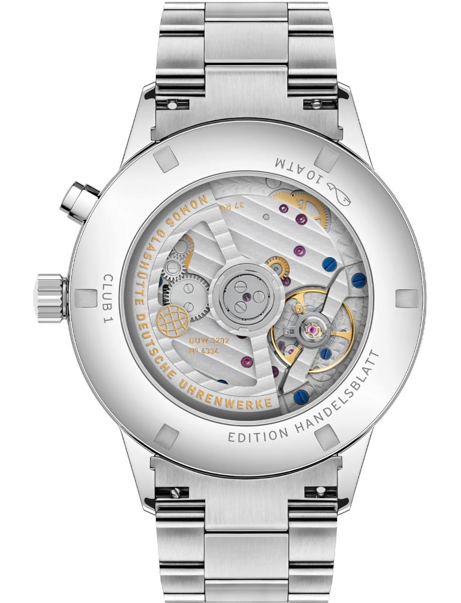 Stainless steel wristwatch shown from the back, revealing inner mechanical movement through a transparent case back with gold and blue accents and engravings.