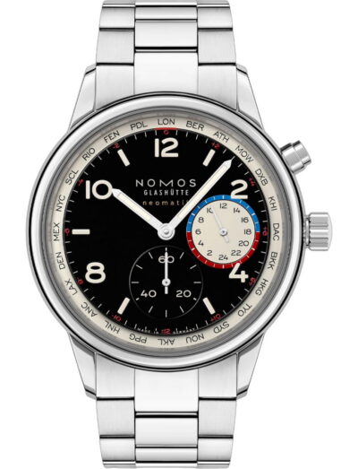 Stainless steel wristwatch with black dial, world time outer ring, and two subdials; brand Nomos Glashütte on face.
