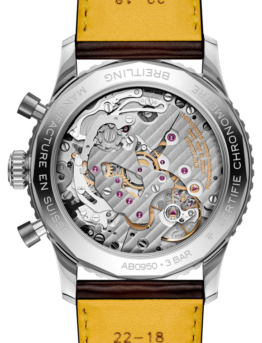 Back view of Breitling Navitimer wristwatch with stainless steel case, gold Santoni calfskin leather strap, and open case back.
