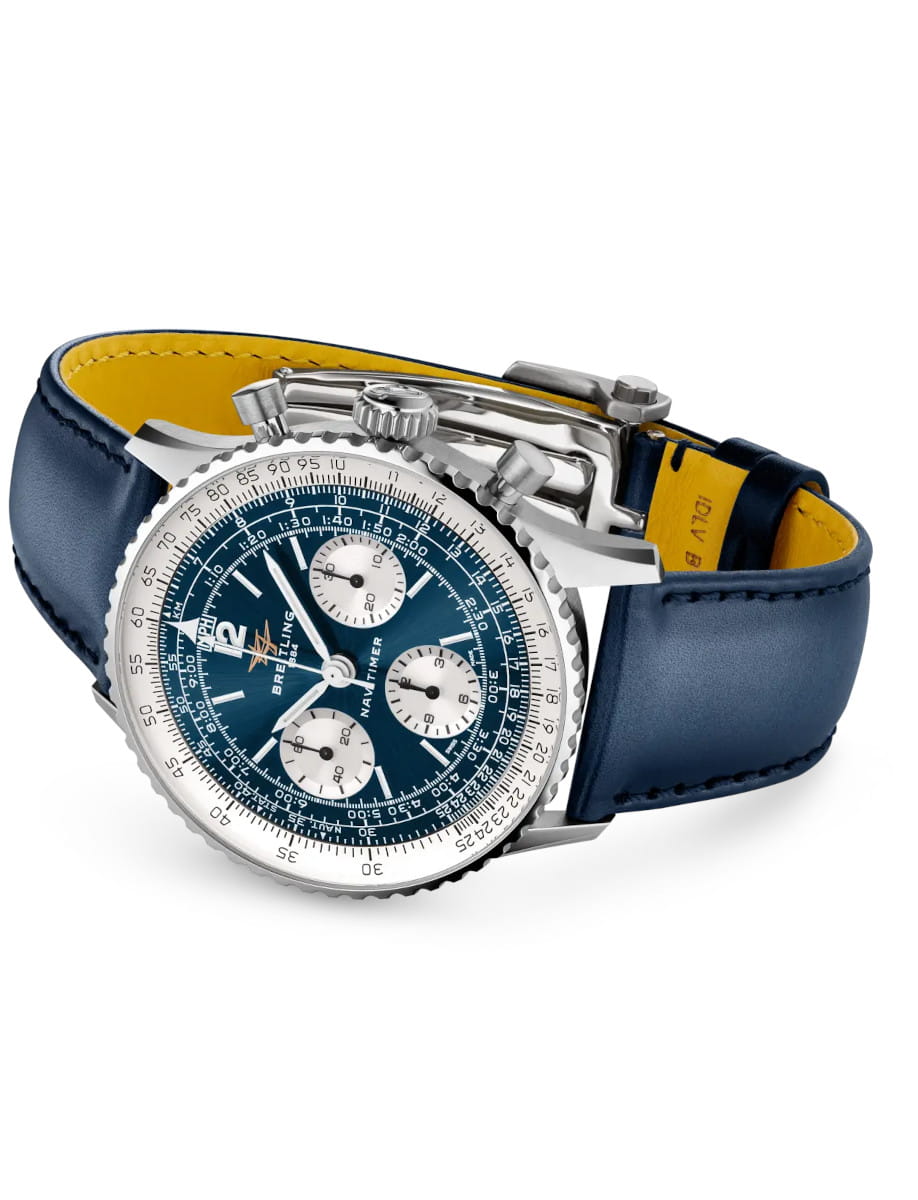 Side view of Breitling Navitimer wristwatch with stainless steel case, blue Santoni calfskin leather strap, and blue panda dial.