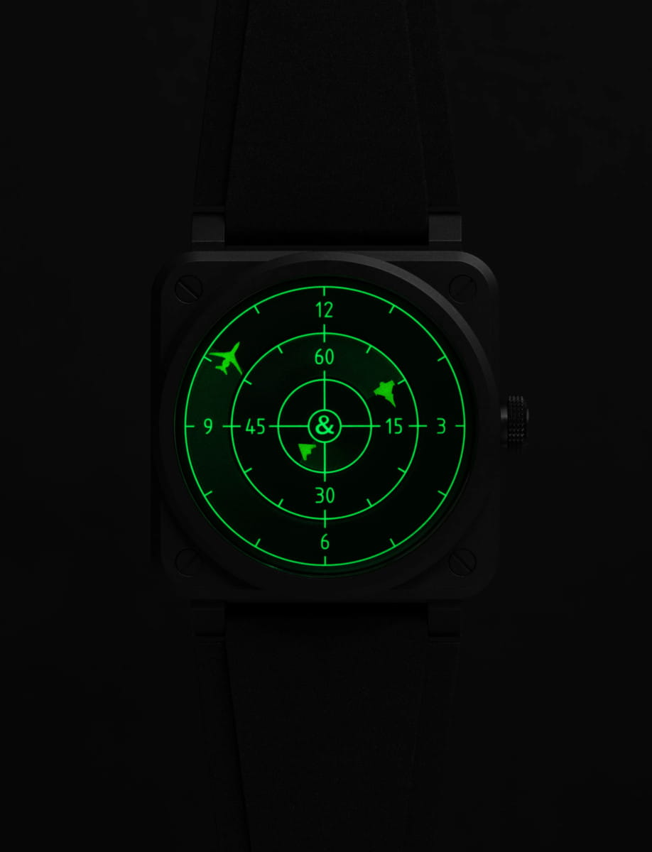 Black square wristwatch with a glowing green radar-style dial featuring airplane icons.