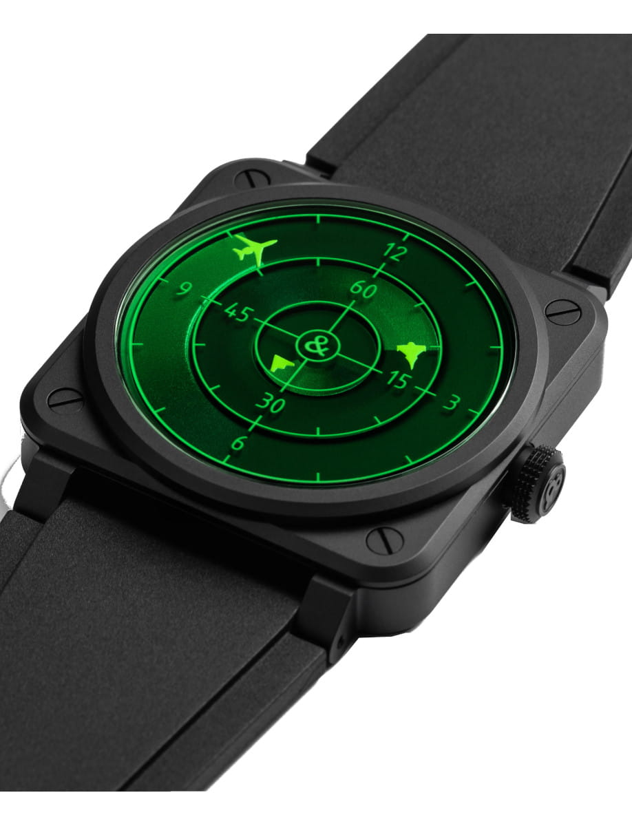 Side view of Bell&Ross wristwatch with black square case with a black dial with green and black strap.