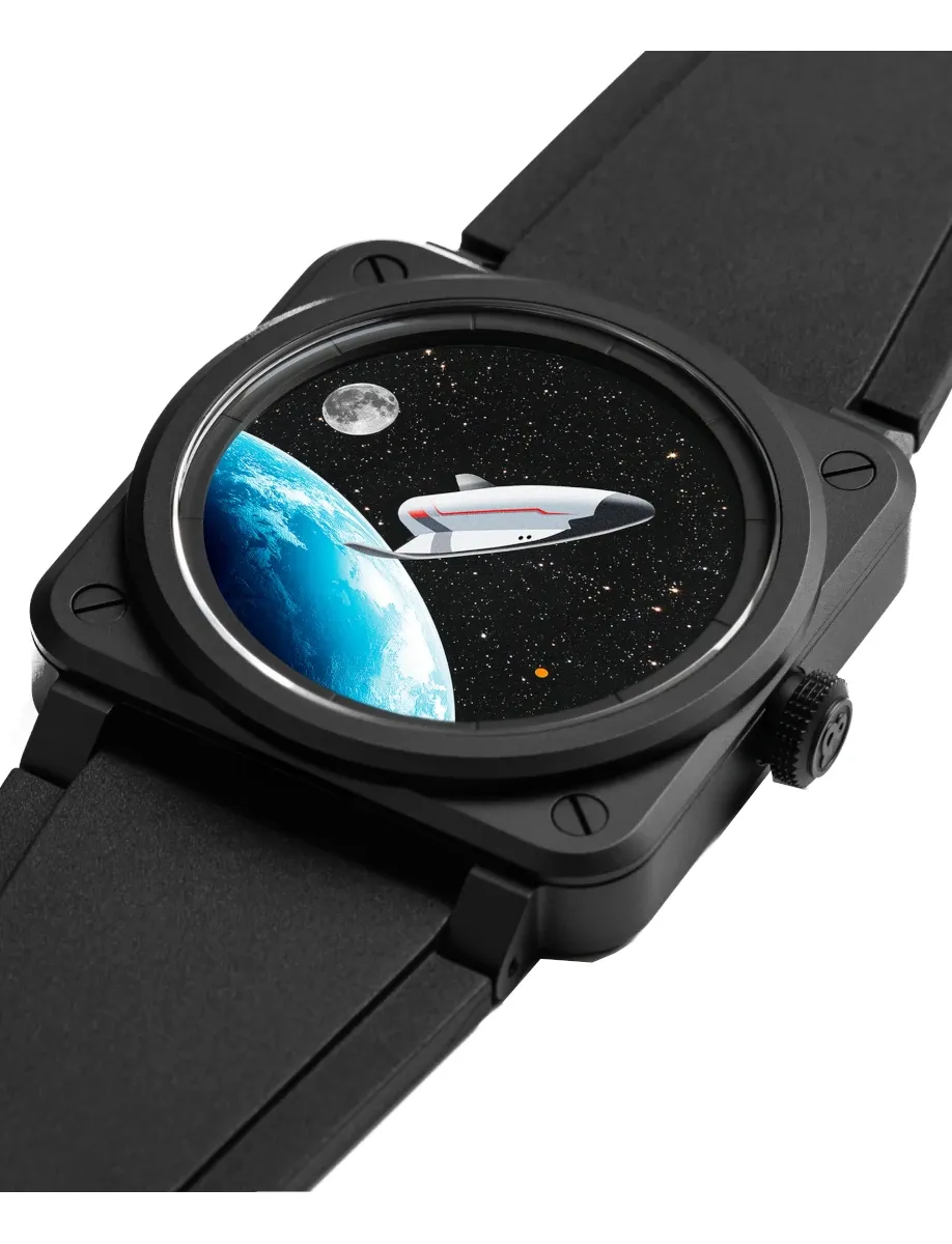 Side view of Bell & Ross wristwatch with black ceramic case, black rubber strap, and dial with black aventurine plate representing space