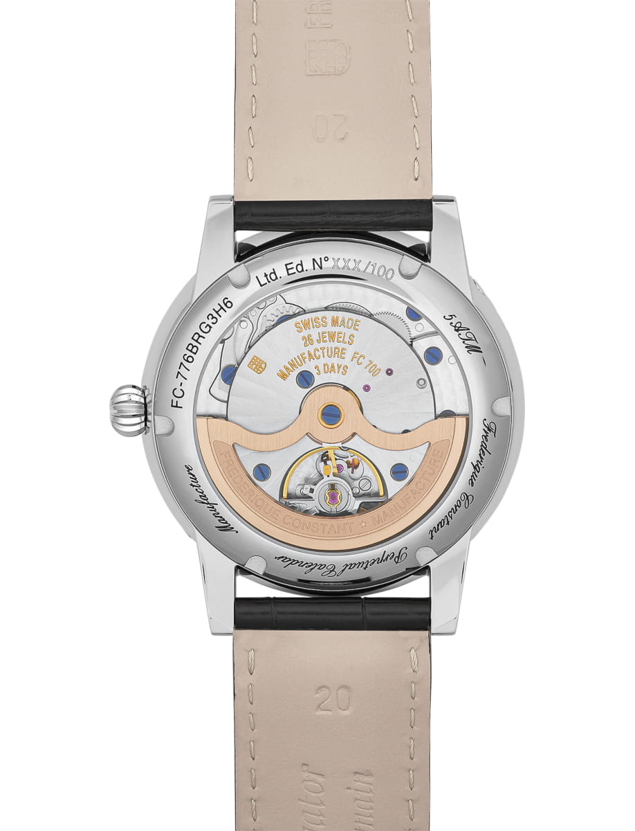 Wristwatch with a transparent case back showing the mechanical movement and gold rotor; beige leather strap attached.