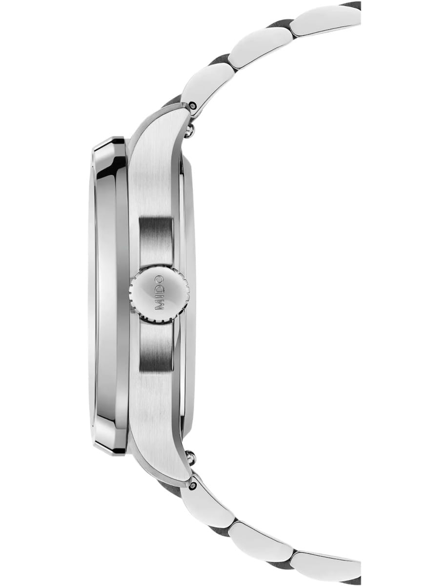 Side view of a Mido stainless steel wristwatch with a brushed case and linked bracelet; crown showing 'MIDO'.