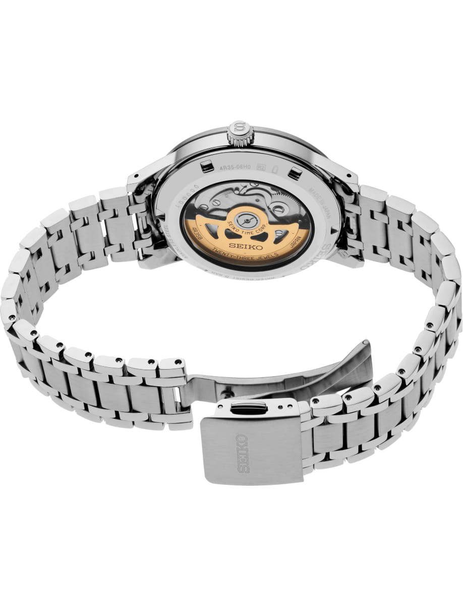 Seiko stainless steel automatic wristwatch with an exhibition case back revealing the rotor and inner movement, metal bracelet and clasp visible
