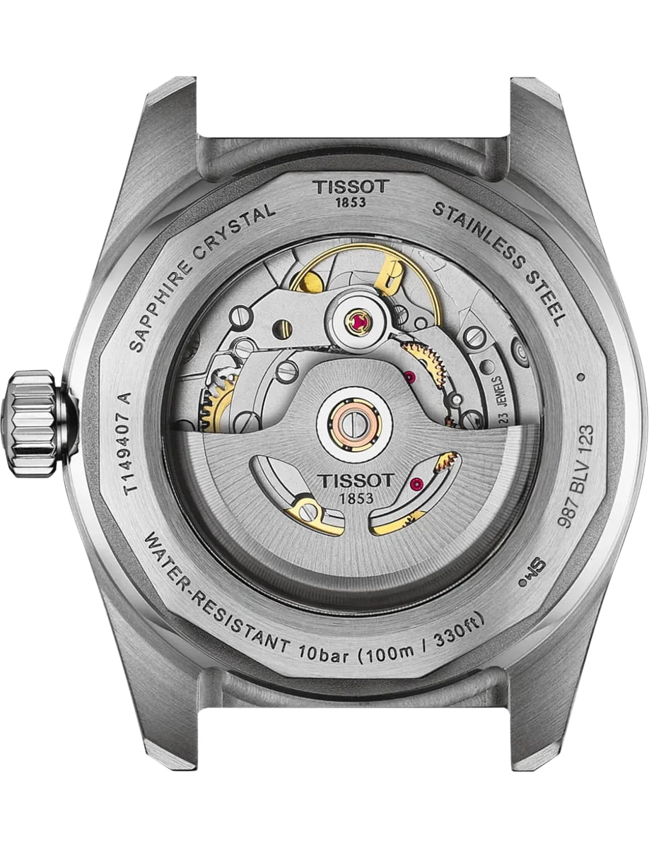 Stainless steel back of a Tissot watch showing the mechanical movement through a transparent caseback; engraving around edge mentions sapphire crystal and 100m water resistance.