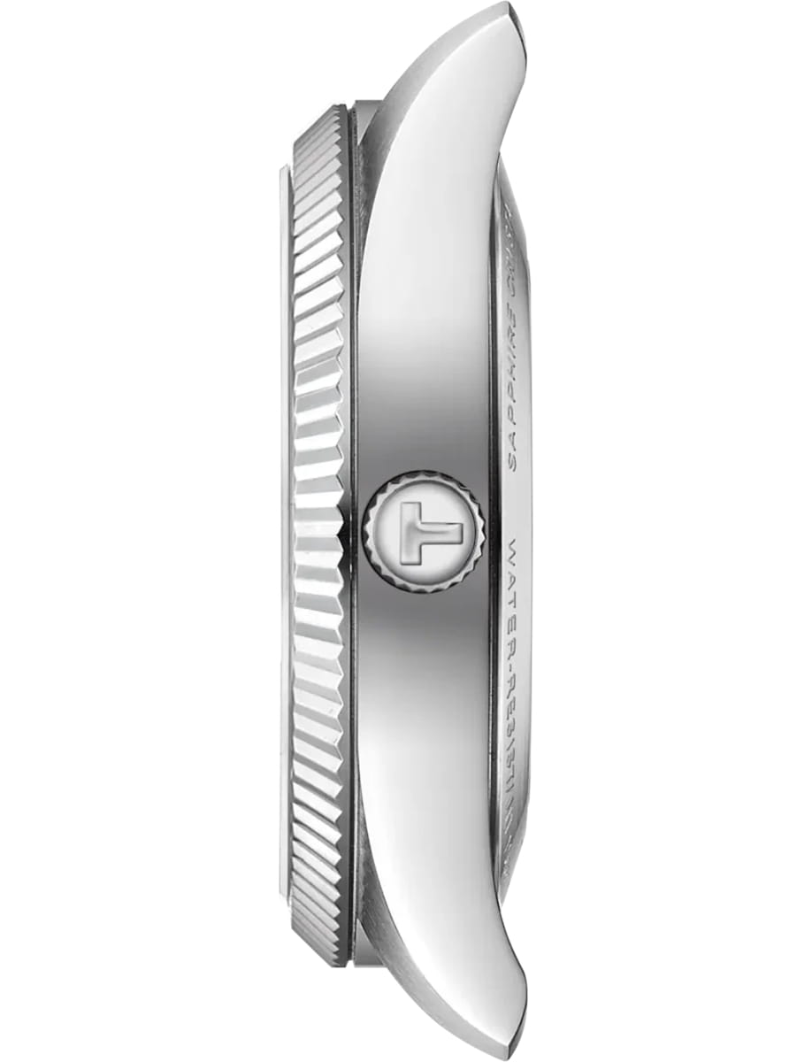 Side view of a silver watch case showing a textured bezel and fluted crown on the left side