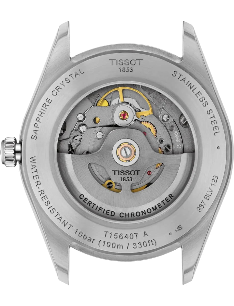 Back view of a stainless steel Tissot watch showing the exposed automatic movement through a transparent case back, with rotor and gears visible.