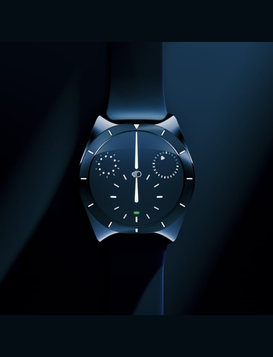 Ressence wristwatch with grade 5 titanium case and dial, and rubber strap.