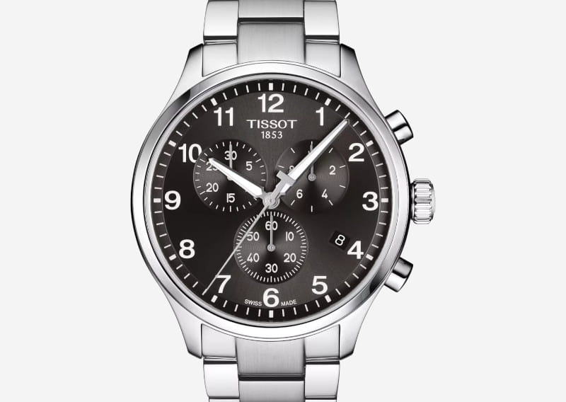 Tissot stainless steel chronograph watch with black dial and multiple subdials on a metal bracelet.